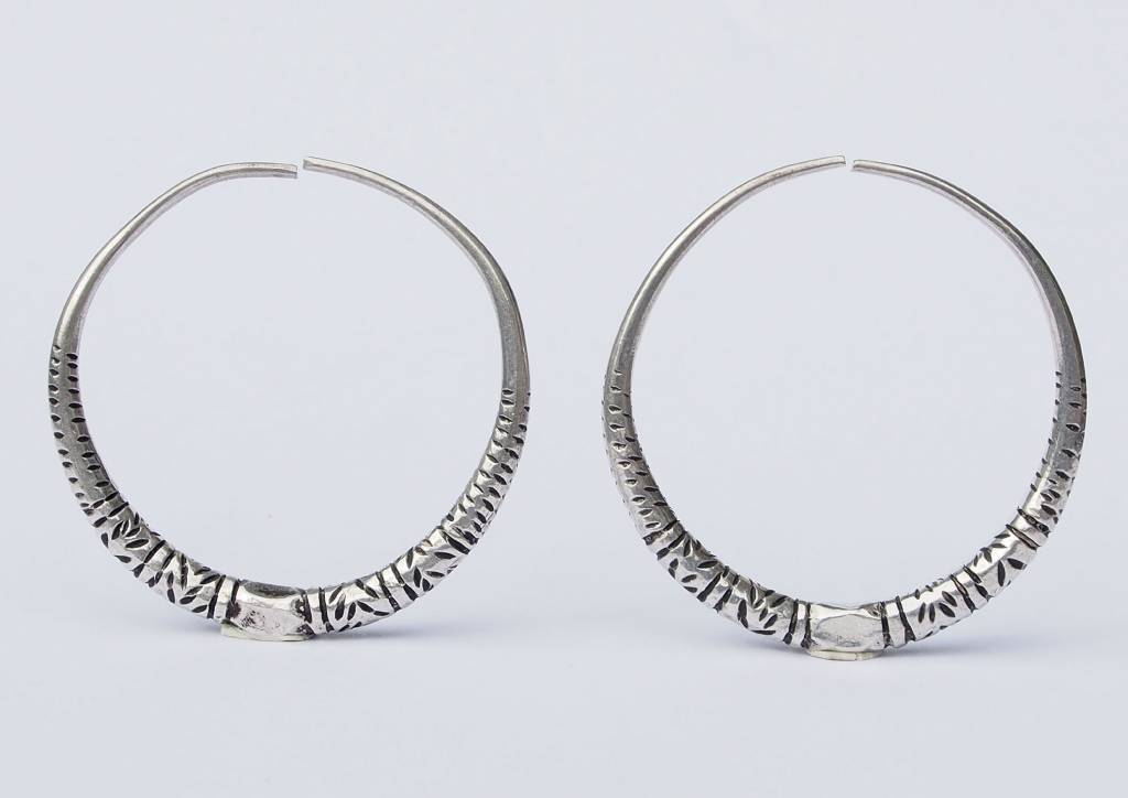 Antique handmade married women wedding nomadic Creolen earring Vintage silver hoops from Auristan Afghanistan Swat valley in Pakistan.