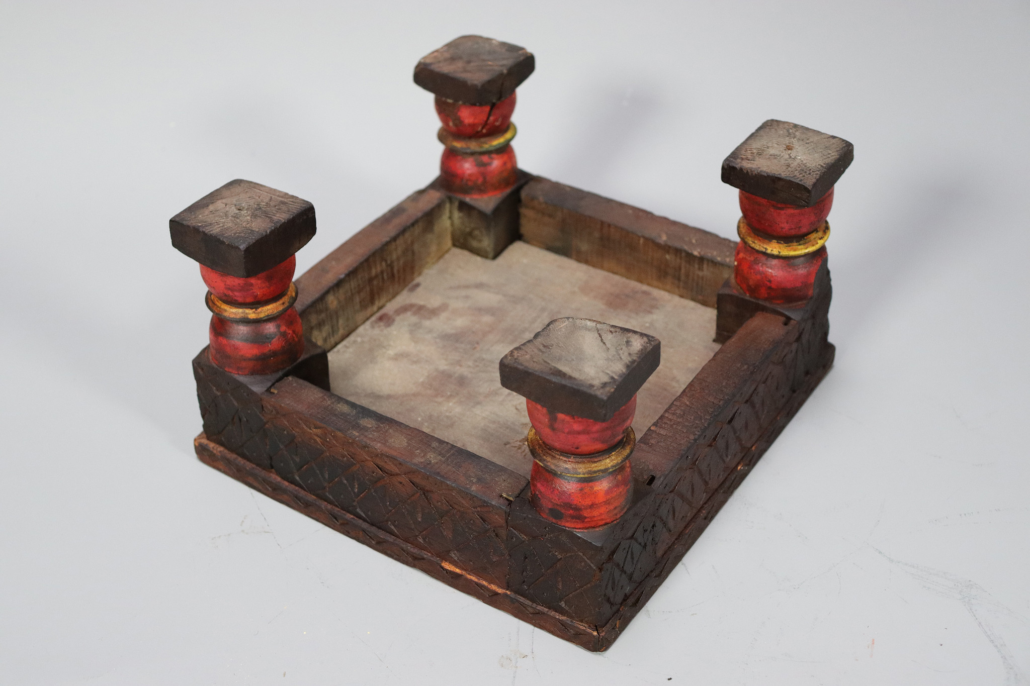 Antique  wooden Unique table  from Afghanistan Nuristan with a beautiful rich patina  24x24 cm - red