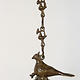 Antique Brass Hanging Bronze Oil Lamp in the Shape of a Bird from india.