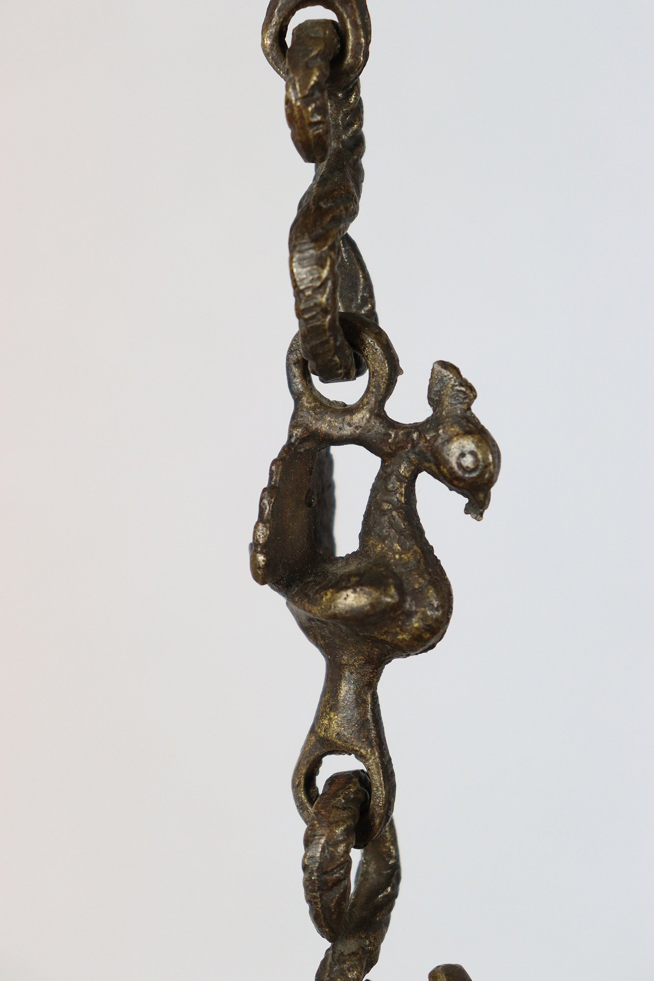 Antique Brass Hanging Bronze Oil Lamp in the Shape of a Bird from india.