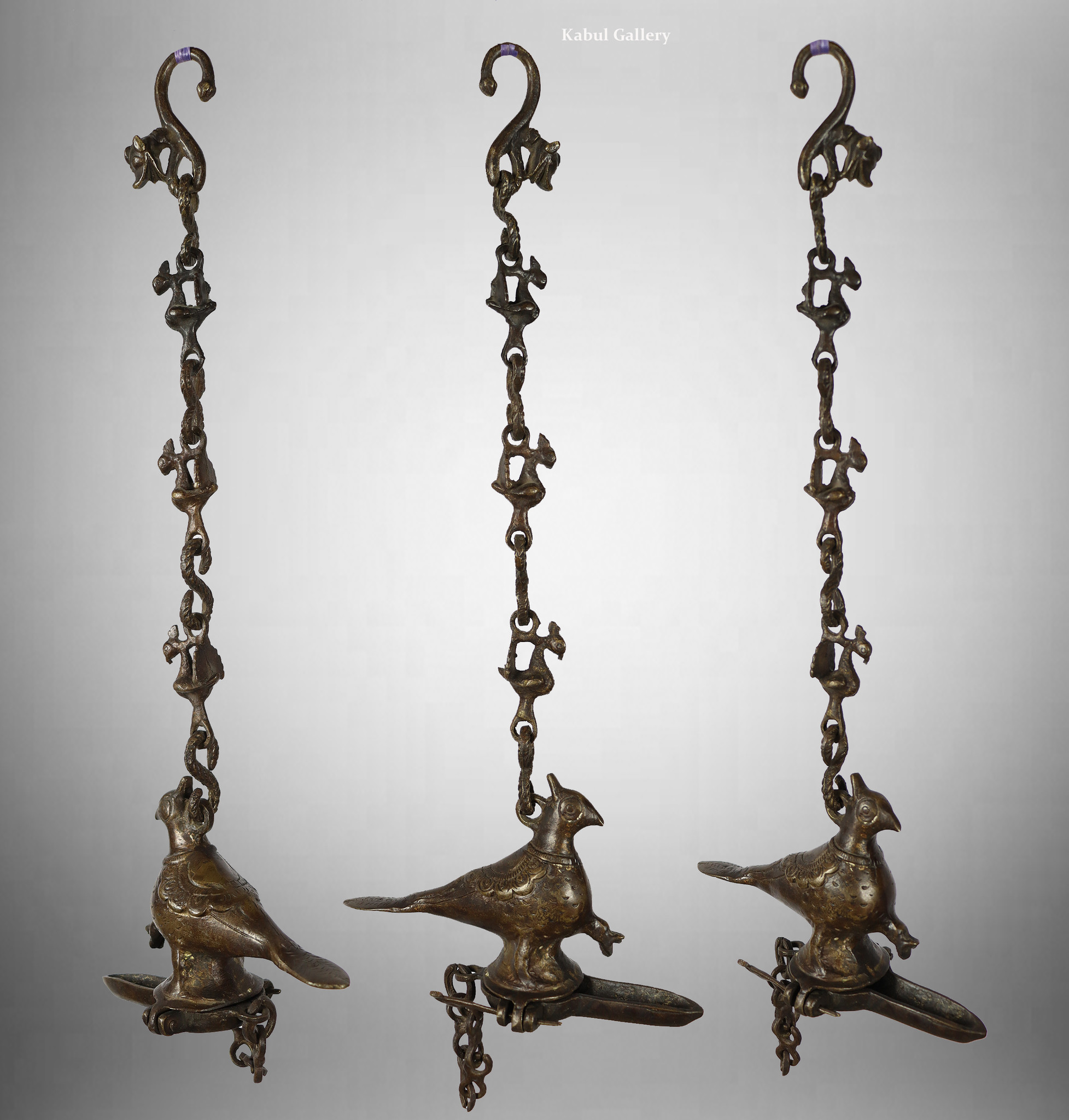 https://cdn.webshopapp.com/shops/127908/files/411064990/antique-brass-hanging-bronze-oil-lamp-in-the-shape.jpg