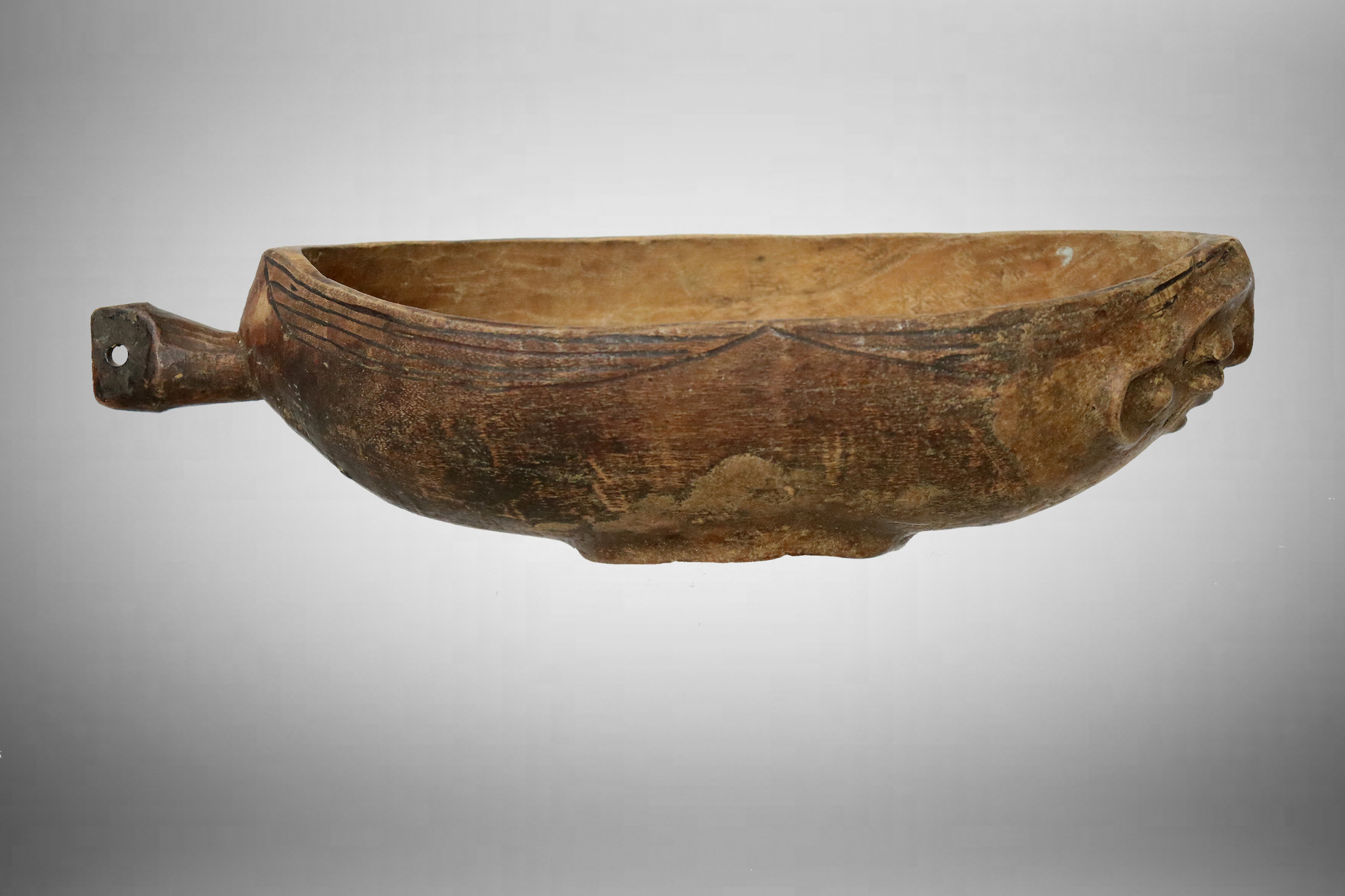 Antique wooden IfugaoI Carved Wooden Ritual Kinahu bowl with Handle from Province Luzon Philippines 19th/ 20thC a beautiful rich patina No/A