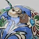 islamic Qajar Kashkul, 20th Century, made from ceramic, stone paste with polychrome flower decoration  underneath a clear glaze.   25A