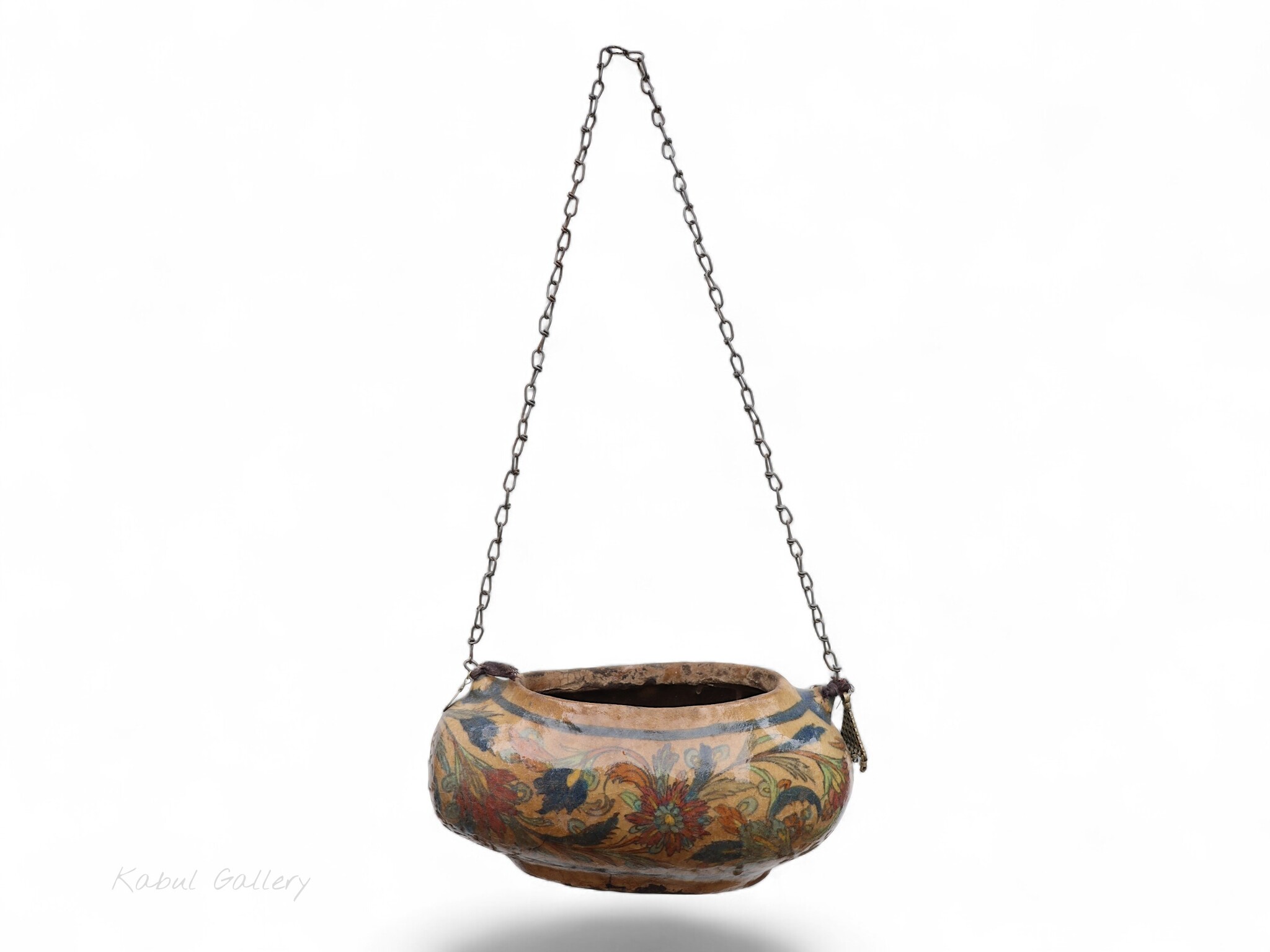 islamic Qajar Kashkul, 20th Century, made from ceramic, stone paste with polychrome flower decoration  underneath a clear glaze.   25B