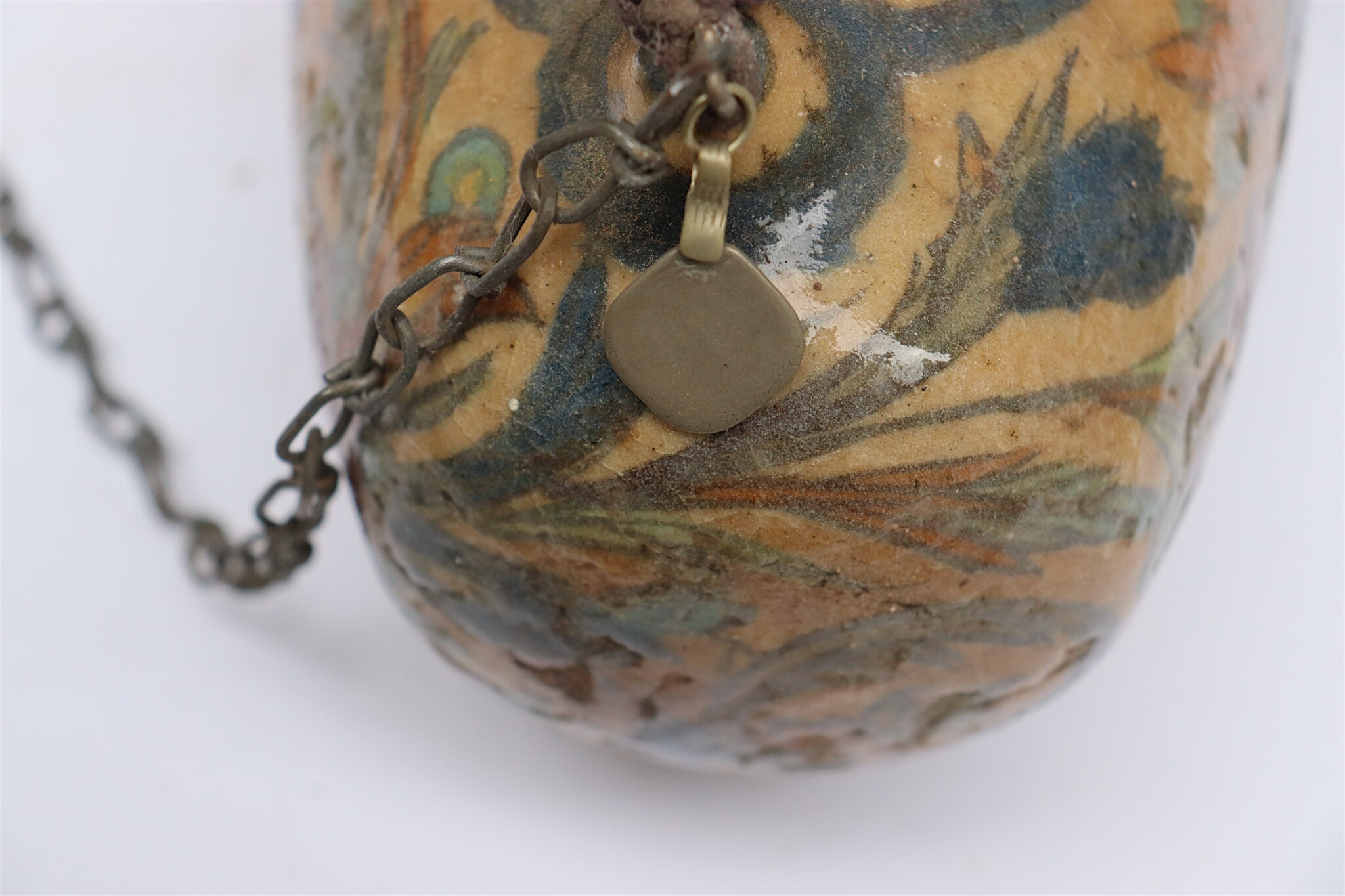 islamic Qajar Kashkul, 20th Century, made from ceramic, stone paste with polychrome flower decoration  underneath a clear glaze.   25B