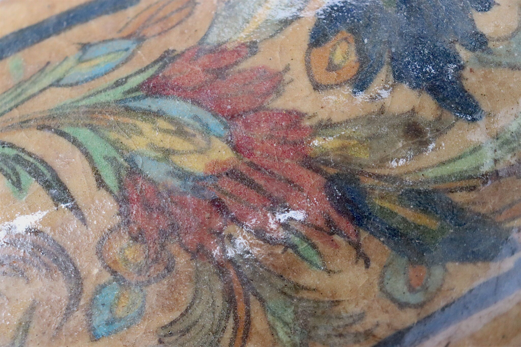 islamic Qajar Kashkul, 20th Century, made from ceramic, stone paste with polychrome flower decoration  underneath a clear glaze.   25B