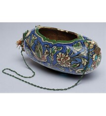 islamic Qajar Kashkul, 20th Century, made from ceramic, stone paste with polychrome flower decoration  underneath a clear glaze.   25A