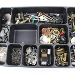 Box filled with divers spinning reel parts