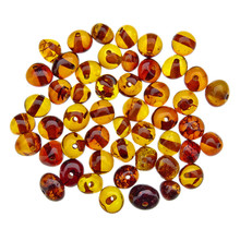 50 pieces amber beads cognac rounded 3-6 mm