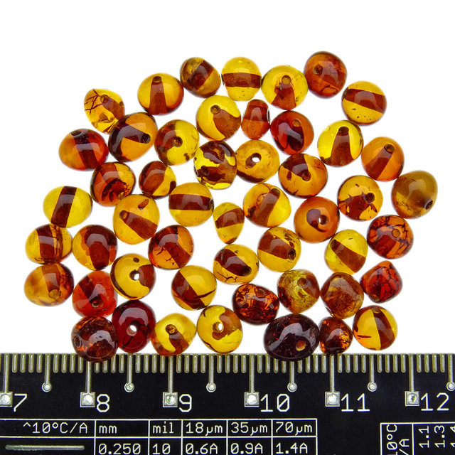 50 stuks barnsteen kralen cognac afgerond 3-6 mm