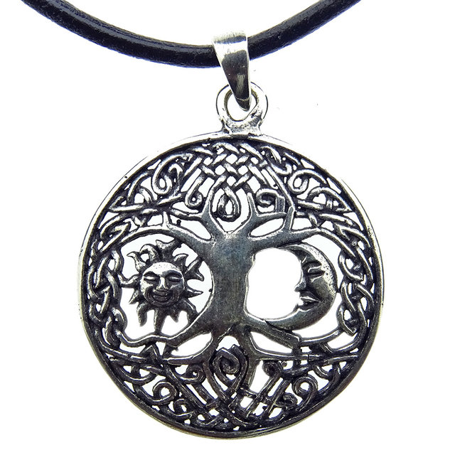 Beautiful silver pendant tree of life with sun and moon Beautiful silver pendant tree of life with sun and moon