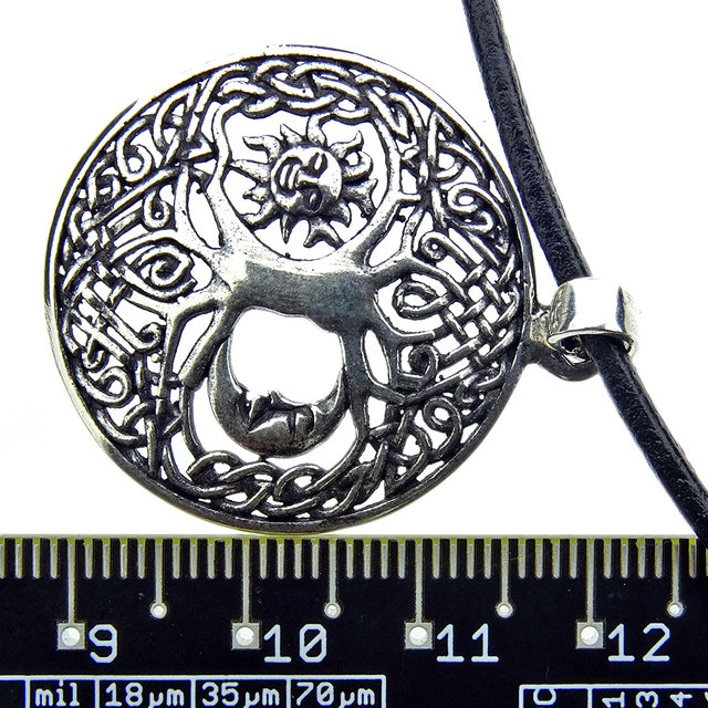 Beautiful silver pendant tree of life with sun and moon Beautiful silver pendant tree of life with sun and moon