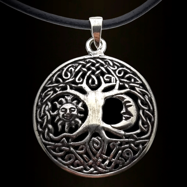 Beautiful silver pendant tree of life with sun and moon Beautiful silver pendant tree of life with sun and moon