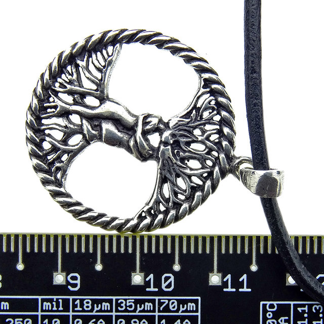Beautiful silver pendant tree of life with Adam and Eve Beautiful silver pendant tree of life with Adam and Eve