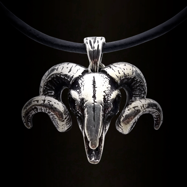Beautiful silver pendant of a ram skull Beautiful silver pendant of a ram skull