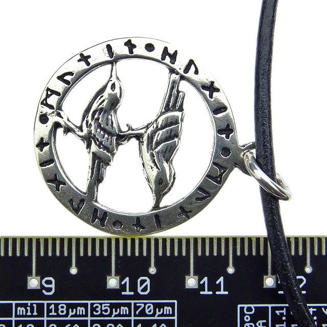 Beautiful silver pendant raven in a rune circle Beautiful silver pendant raven in a rune circle