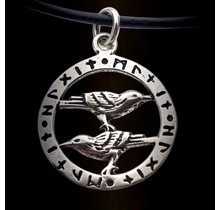 Beautiful silver pendant raven in a rune circle