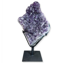 Amethyst on metal base 53 cm high and weighs 25,6 kg