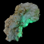 Hyalite opal with green fluorescence under a short-wave UV light Hyalite opal with green fluorescence under a short-wave UV light