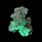 Hyalite opal with green fluorescence under a short-wave UV light Hyalite opal with green fluorescence under a short-wave UV light