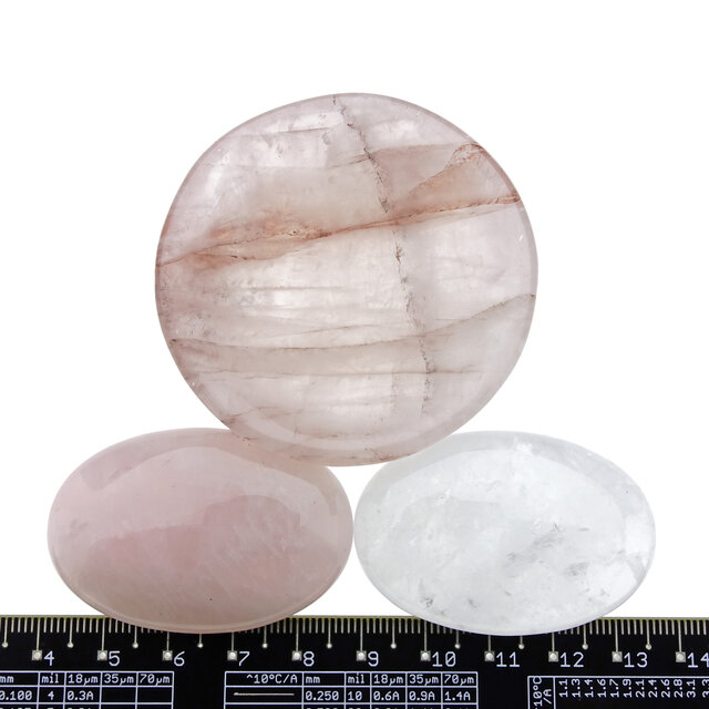 Bowl from red healer with handstones of rose quartz and rock crystal