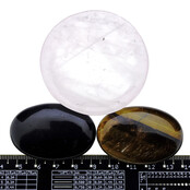 Bowl from rose quartz with handstones of tigereye and obsidian Bowl from rose quartz with handstones of tigereye and obsidian