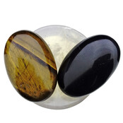 Bowl from rose quartz with handstones of tigereye and obsidian Bowl from rose quartz with handstones of tigereye and obsidian