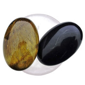 Bowl from rose quartz with handstones of tigereye and obsidian Bowl from rose quartz with handstones of tigereye and obsidian