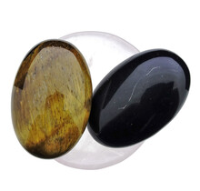 Bowl from rose quartz with handstones of tigereye and obsidian