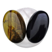 Bowl from rose quartz with handstones of tigereye and obsidian Bowl from rose quartz with handstones of tigereye and obsidian