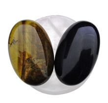 Bowl from rose quartz with handstones of tigereye and obsidian