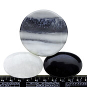 Bowl from zebra jasper with handstones of rock crystal and obsidian Bowl from zebra jasper with handstones of rock crystal and obsidian