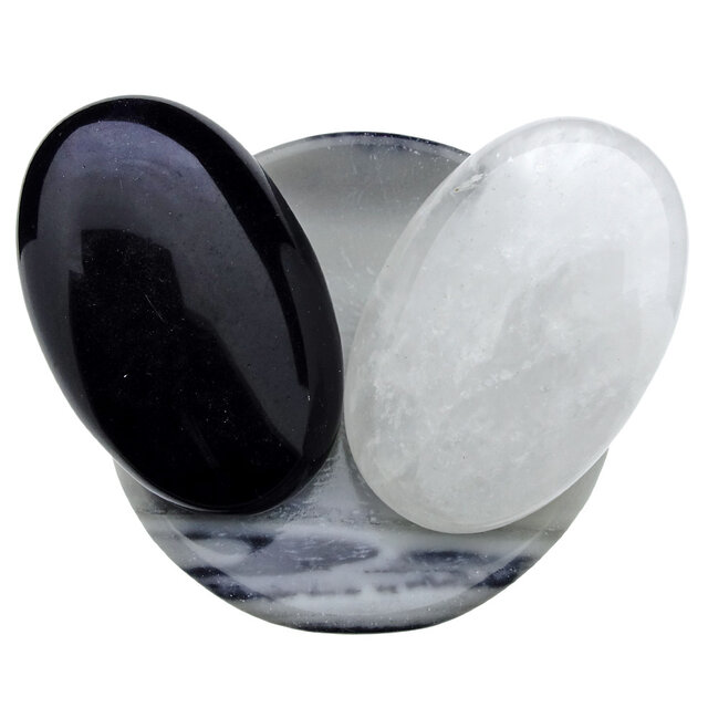 Bowl from zebra jasper with handstones of rock crystal and obsidian Bowl from zebra jasper with handstones of rock crystal and obsidian