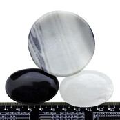 Bowl from zebra jasper with handstones of rock crystal and obsidian Bowl from zebra jasper with handstones of rock crystal and obsidian