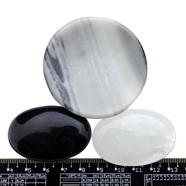 Bowl from zebra jasper with handstones of rock crystal and obsidian Bowl from zebra jasper with handstones of rock crystal and obsidian