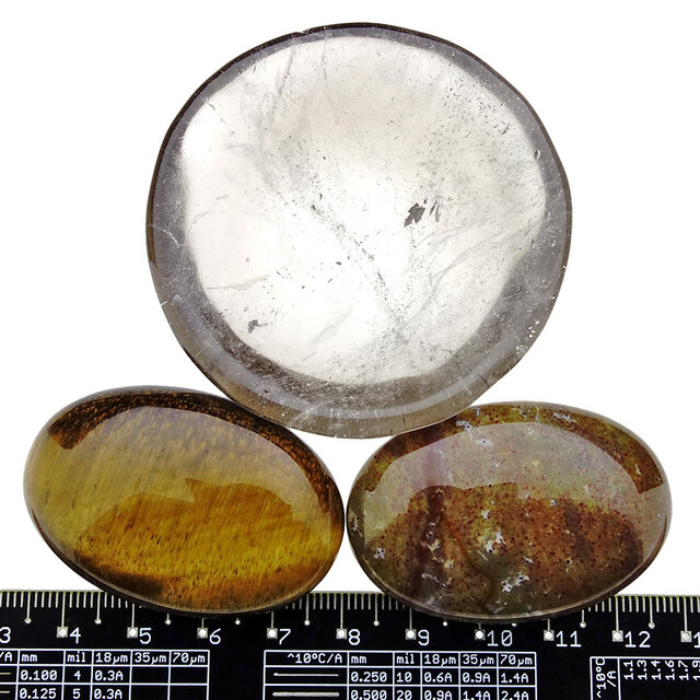 Bowl from smokey quartz with handstones of tigereye and jasper Bowl from smokey quartz with handstones of tigereye and jasper