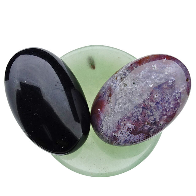 Bowl from aventurine with handstones of jasper and obsidian Bowl from aventurine with handstones of jasper and obsidian