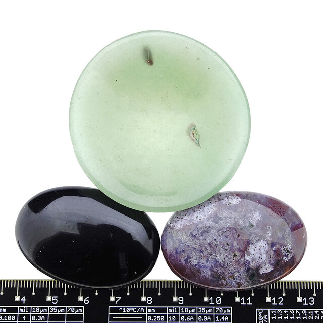 Bowl from aventurine with handstones of jasper and obsidian Bowl from aventurine with handstones of jasper and obsidian