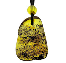 Beautiful pierced Baltic amber pendant with cord