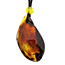 Beautiful pierced Baltic amber pendant with cord