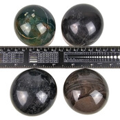 Edelsteinkugel-Vorteilsset mit Haltern aus Naturstein. Edelsteinkugel-Vorteilsset mit Haltern aus Naturstein.