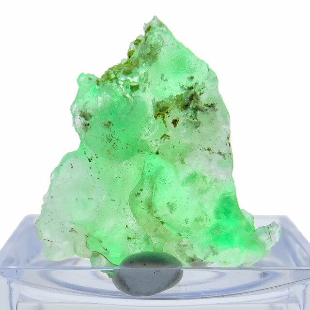 Hyalite opal with green fluorescence under UV light Hyalite opal with green fluorescence under UV light