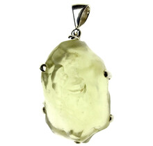 Libyan glass or gold tektite pendant in silver 16 grams