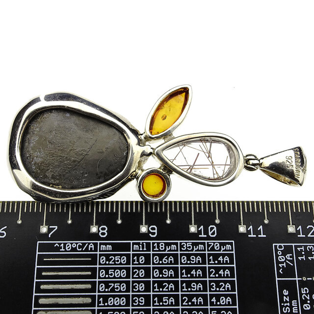 Rutile quarz pendant with amber and ammonite in silver