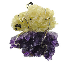 Pendant of rough heated and natural amethyst. The pendant is goldplated