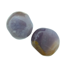 Wunderschöne violette Trommelsteine ​​aus Indonesien