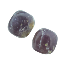 Wunderschöne violette Trommelsteine ​​aus Indonesien