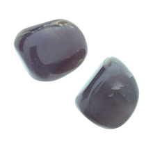 Wunderschöne violette Trommelsteine ​​aus Indonesien