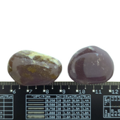 Wunderschöne violette Trommelsteine ​​aus Indonesien