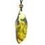 Beautiful pierced Baltic amber pendant with cord